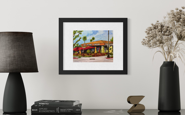 The Filling Station, framed and mocked up on a wall